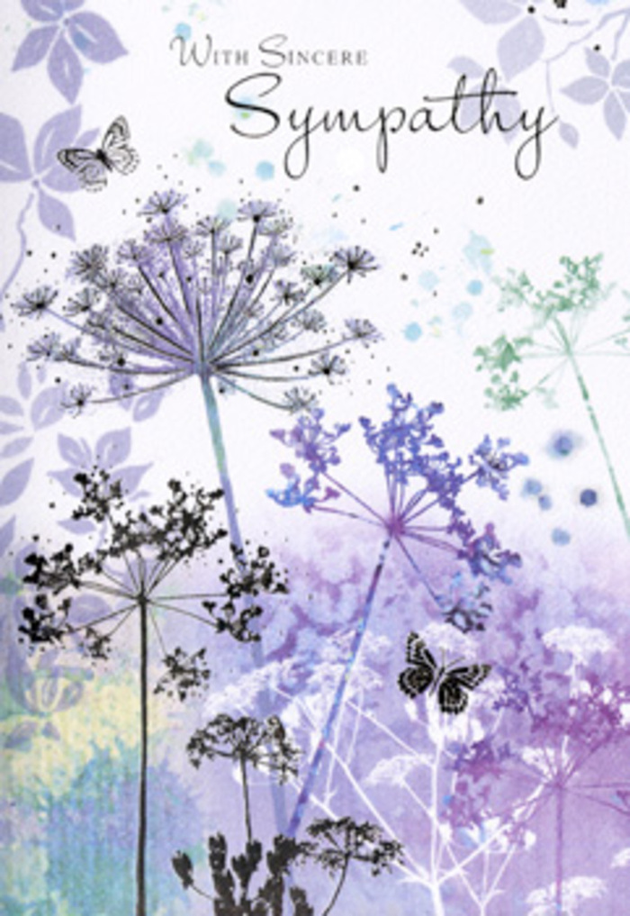 There is a serene, riverside hush in the illustration on this sympathy card, reminiscent of walking through Erith on a quiet evening. Fine, willowy stems of wild umbelliferous flowers stretch upwards, their heads composed of many tiny, star-like florets arranged in airy clusters. These delicate forms are rendered in softened hues of lavender, heather, indigo, and blue-grey, interlaced with gentle touches of silvery green that echo the subdued colours of the Thames on a cloudy day. Watercolour washes flow across the card, creating gradients where purple blends seamlessly into green, and darker shades fade into whisper-light tones as they reach the edges. The flowers themselves look slightly translucent at the tips, as though lit from behind by veiled, diffused light. In the space between the stems, a couple of butterflies appear, their wings almost see-through, outlined in the faintest strokes, as if they are visiting for a fleeting moment and yet somehow staying in spirit. The background is intentionally blurred and abstract, a calm field of lilac and sage that lets the eye focus on the delicate, vertical movement of the blooms. There is no clutter, only a sense of breathing space and understated elegance. The emotional tone is one of gentle remembrance and respect, similar to the quiet after mourners leave a graveside. You can imagine this card being chosen to accompany a tasteful funeral tribute from Erith Florist, delivered to families around the town centre, offering a soft, nature-inspired way to say, I'm thinking of you when a loved one has been lost.