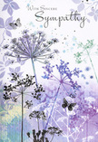 This sympathy card carries the feeling of a calm, reflective moment by the Erith shoreline, translated into delicate brushstrokes. From the lower edge, slim greenish stems rise in graceful arcs, supporting clusters of umbelliferous flower heads that fan out like tiny, intricate fireworks frozen in time. Their colours are quiet and cool-shades of lavender, violet-blue, and dusty indigo mingling softly with muted sage and silvery grey. The artist's watercolour technique leaves edges slightly blurred, so each bloom seems to melt gently into the air, suggesting fragility and transience. Behind the flowers, a misty wash of pale purple and soft green creates a dreamy backdrop, more suggestion than scene, like distant fields glimpsed through morning fog near Riverside Gardens. Among the petals, a few translucent butterflies drift, their wings just barely defined, adding a subtle note of transformation and gentle companionship. Light is spread evenly across the image, creating no sharp highlights, only a tender, velvety glow that calms rather than distracts. The overall design is spare yet full of feeling, with generous open space around the illustrations so the viewer's gaze can wander slowly. It feels like a visual sigh-a way of saying what the heart holds when words come out in whispers. Paired with a soft-toned condolence bouquet from Erith Florist, perhaps delivered to a quiet street just off the High Street, this card offers a respectful, nature-inspired expression of sympathy, acknowledging both grief and the enduring beauty of cherished memories.
